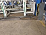 a large machine that is sitting in a warehouse