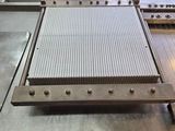 an image of a machine that is cutting metal