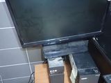 an image of a tv and speakers in a small room