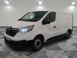 la photo d'une camionnette blanche sur un sol en damier