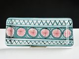 turquoise and pink rectangular platter with geometric design on it