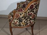 a chair that is sitting on a tile floor