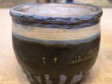 a close up of a bowl sitting on a table