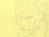 drawing of a man ' s face on a piece of yellow paper