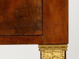 an image of a wooden table with a marble top and gold trim