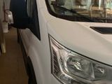 a white van that is parked in a garage