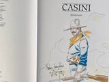 a book with a drawing of a man holding a gun