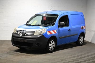 a picture of a blue van parked in a garage
