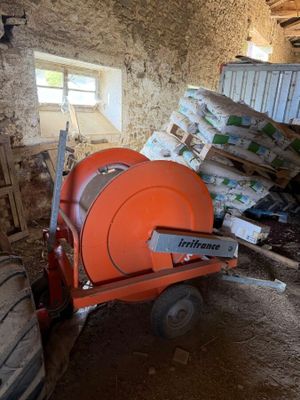 a cement mixer sitting in the middle of a room