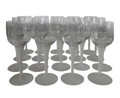 a lot of empty wine glasses sitting on a table