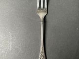 a fork that is sitting on top of a table