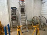 two ladders that are next to each other in a room