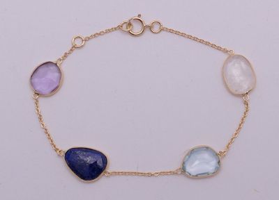 Très beau bracelet en or jaune 750/°(18K) 3g70 ornée de topa…