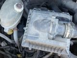 a small engine in the trunk of a car