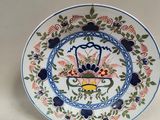 a plate with a design on it on a table