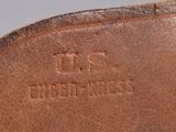 the bottom of a pair of brown leather shoes with the word u s bridals written on it