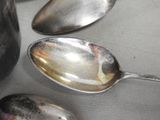 three spoons that are sitting next to each other