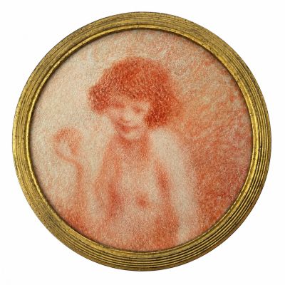 une vieille photo d'une femme aux cheveux roux dans un cadre doré