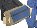 a pile of clothing that is sitting on a table