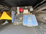 a close up of a control panel on the back of a truck