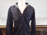 a mannequin with a sailor ' s uniform on it