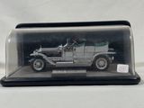 a model of an old car in a glass case