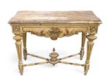 an antique console table with a marble top and ornate carvings