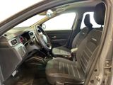 the interior of a car with the door open showing the driver ' s seat covers
