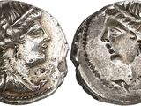 a silver coin with an image of a man on it
