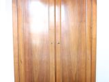 an image of a wooden armoire in a living room