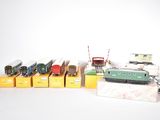 a lot of toy trains that are sitting on a table