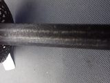 a close up of a baseball bat on a table