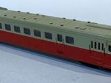 a toy train that is sitting on a white surface