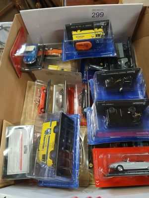 a box full of toy cars that are in it