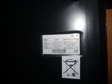 a picture of a black door with a ticket attached to it