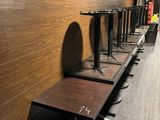 a long row of tables in the middle of a room