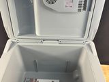 a cooler that is sitting on a table in a room