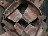 a close up of a helmet with a strap on it