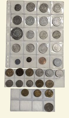 a lot of coins that are in a clear box