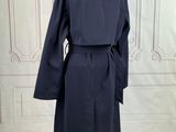 the back of a black coat on a mannequin mannequin mannequin mannequin mannequin mannequin mannequin mannequin