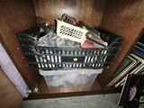 a plastic basket with a remote control inside of it