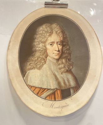 portrait of a man with curly hair and a fur collar