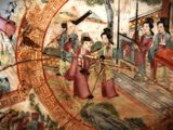 a painting on the wall of a building with people in it