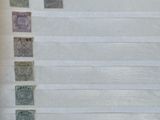a picture of a piece of paper that has a lot of stamps on it
