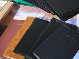 a lot of books that are on a table