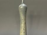 a small vase that is sitting on a table