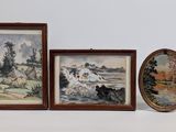 three framed paintings of a landscape and a painting of a river