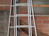 a picture of a room with a ladder and a fire hydrant