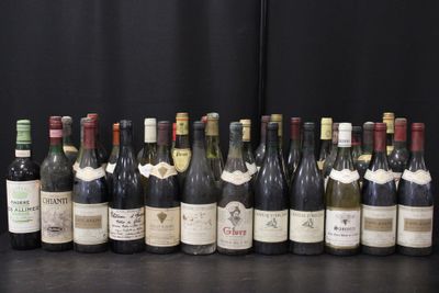 many bottles of wine lined up on a table