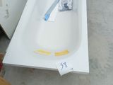a bathtub that is sitting in the middle of the floor